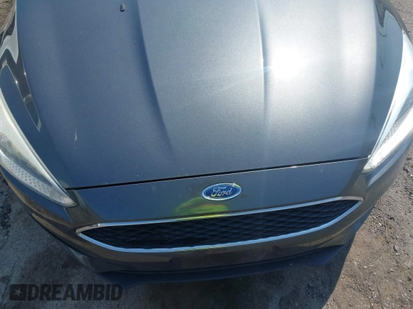 2016 Ford Focus SE with VIN 1FADP3F28GL403388, listed as a IAAI auction lot 42800054 with 190,860 mi miles and . Bid and sale history available at DreamBid. Image 6.