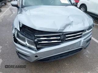 2019 Volkswagen Tiguan S with VIN 3VV1B7AX9KM110873, listed as a IAAI auction lot 42010931 with 82,745 mi miles and . Bid and sale history available at DreamBid. Image 6.