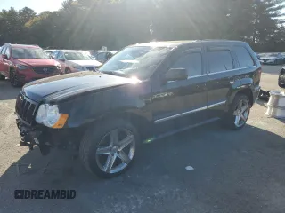 2008 Jeep Grand Cherokee SRT-8 with VIN 1J8HR78368C152318, listed as a Copart auction lot 74203604 with 157,840 mi miles and Salvage Title. Bid and sale history available at carsss.com. Image 1.