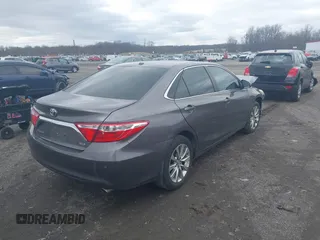 2015 Toyota Camry XLE with VIN 4T1BF1FKXFU936775, listed as a IAAI auction lot 41807486 with 97,148 mi miles and . Bid and sale history available at DreamBid. Image 4.