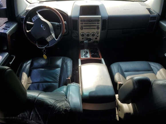 2004 Infiniti QX56 with VIN 5N3AA08C34N803087, listed as a Copart auction lot 67706944 with 170,095 mi miles and Salvage Title. Bid and sale history available at carsss.com. Image 8.