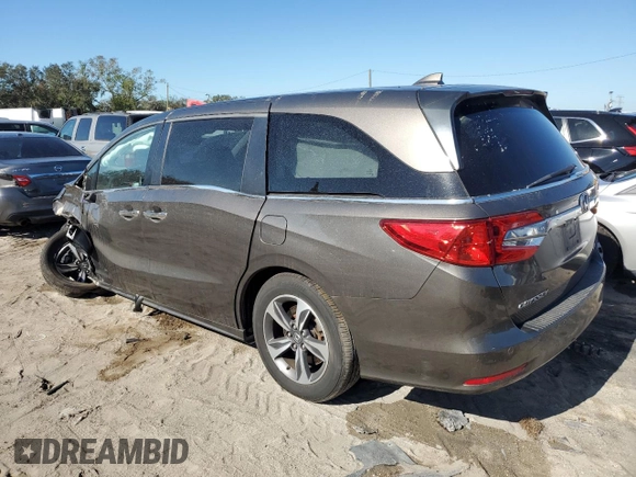 2020 Honda Odyssey Touring with VIN 5FNRL6H84LB012640, listed as a Copart auction lot 80430814 with 58,313 mi miles and Salvage Title. Bid and sale history available at DreamBid. Image 2.