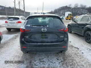 2023 Mazda CX-5 2.5 S with VIN JM3KFBAM3P0233411, listed as a IAAI auction lot 41339203 with 25,174 mi miles. Bid and sale history available at carsss.com. Image 17.