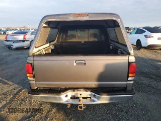 1999 Mazda B-Series 2WD Truck SE with VIN 4F4YR16V7XTM09808, listed as a Copart auction lot 87118994 with 117,698 mi miles and Clean Title. Bid and sale history available at carsss.com. Image 6.