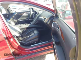 2015 Lincoln MKZ z VIN 3LN6L2G9XFR618075, wystawiony jako IAAI lot #41469247 z przebiegiem 152 966 mil mil oraz . Historia ofert i sprzedaży dostępna na DreamBid. Obrazek 5.