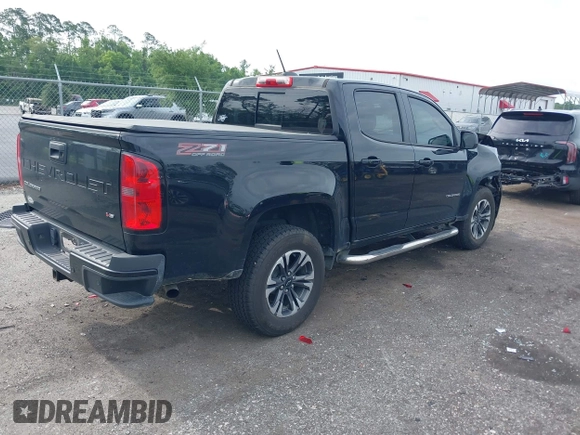 2021 Chevrolet Colorado 4WD Z71 with VIN 1GCGTDEN5M1190797, listed as a IAAI auction lot 42473079 with 77,290 mi miles and . Bid and sale history available at DreamBid. Image 4.