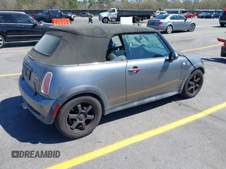 2005 MINI Convertible S with VIN WMWRH33545TF85051, listed as a IAAI auction lot 41843147 with 109,656 mi miles and . Bid and sale history available at DreamBid. Image 4.
