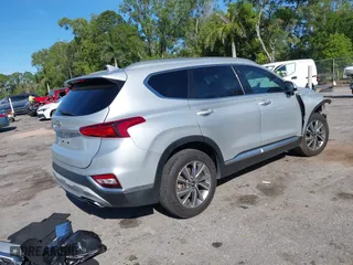 2020 Hyundai Santa Fe SEL with VIN 5NMS33AD3LH161594, listed as a IAAI auction lot 41857469 with 129,374 mi miles. Bid and sale history available at carsss.com. Image 4.