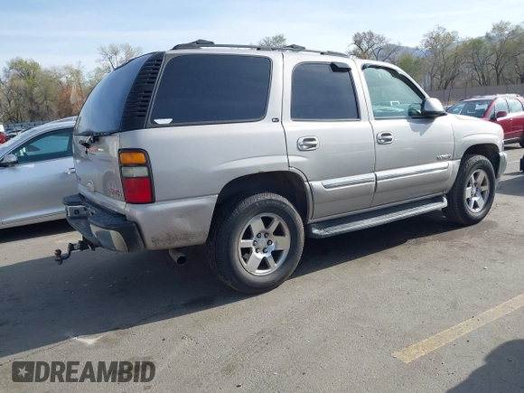 2005 GMC Yukon SLT with VIN 1GKEK13T15J118270, listed as a IAAI auction lot 41937413 with 218,057 mi miles. Bid and sale history available at carsss.com. Image 4.