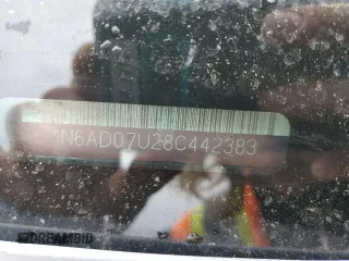 2008 Nissan Frontier SE z VIN 1N6AD07U28C442383, wystawiony jako Copart lot #52042495 z przebiegiem 137 155 mil mil oraz Szkoda całkowita • Salvage title. Historia ofert i sprzedaży dostępna na DreamBid. Obrazek 14.