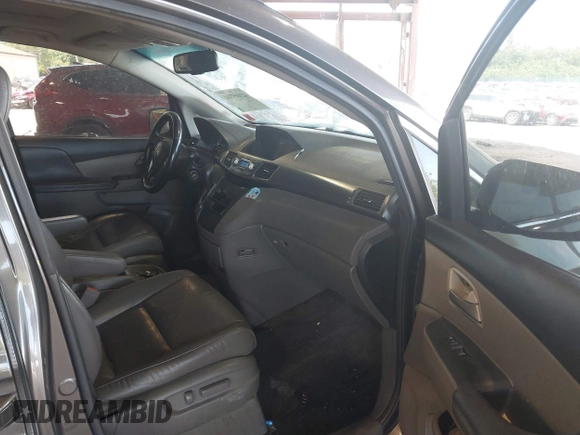 2012 Honda Odyssey EX-L with VIN 5FNRL5H67CB016934, listed as a IAAI auction lot 42405714 with 248,512 mi miles and . Bid and sale history available at DreamBid. Image 5.