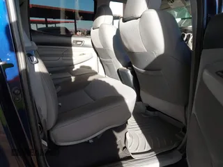 2013 Toyota Tacoma PreRunner z VIN 3TMKU4HN6DM038078, wystawiony jako IAAI lot #41397637 z przebiegiem 109 017 mil mil oraz . Historia ofert i sprzedaży dostępna na DreamBid. Obrazek 8.