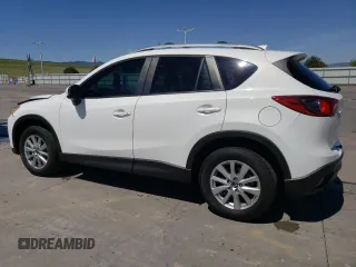 2014 Mazda CX-5 Touring z VIN JM3KE4CYXE0393443, wystawiony jako Copart lot #54738705 z przebiegiem 68 220 mil mil oraz Szkody całkowita. Historia ofert i sprzedaży dostępna na DreamBid. Obrazek 2.