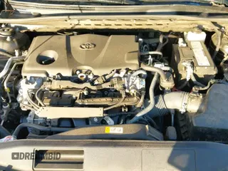 2023 Toyota Camry SE z VIN 4T1G11AK5PU728431, wystawiony jako IAAI lot #43375659 z przebiegiem 52 597 mil mil oraz . Historia ofert i sprzedaży dostępna na DreamBid. Obrazek 19.