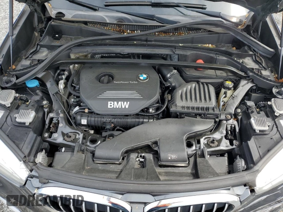 2016 BMW X1 xDrive28i z VIN WBXHT3C37GP888364, wystawiony jako Copart lot #53644975 z przebiegiem 119 725 mil mil oraz Szkoda całkowita • Salvage title. Historia ofert i sprzedaży dostępna na DreamBid. Obrazek 12.