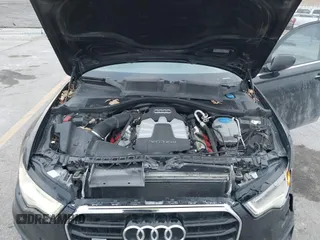 2013 Audi A6 3.0T Prestige with VIN WAUHGAFC3DN061788, listed as a IAAI auction lot 41129245 with 137,575 mi miles. Bid and sale history available at carsss.com. Image 10.