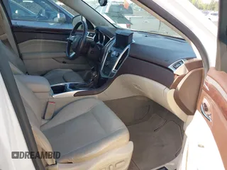 2011 Cadillac SRX Performance Collection with VIN 3GYFNBEYXBS540807, listed as a IAAI auction lot 42034047 with 198,429 mi miles. Bid and sale history available at carsss.com. Image 5.