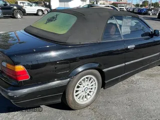 1997 BMW 3-Series 328IC with VIN WBABK8324VET98240, listed as a Copart auction lot 52457785 with 1 mi miles and Clean Title. Bid and sale history available at carsss.com. Image 4.