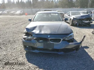 2015 BMW 3 Series 328i xDrive with VIN WBA3B5G50FNS15781, listed as a Copart auction lot 53875595 with 77,286 mi miles and Salvage Title. Bid and sale history available at carsss.com. Image 5.