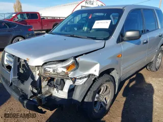 2006 Honda Pilot LX with VIN 2HKYF18156H556689, listed as a IAAI auction lot 40792236 with 273,856 mi miles. Bid and sale history available at carsss.com. Image 6.