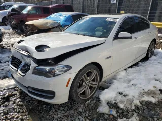 2014 BMW 5 Series 535d with VIN WBAXA5C5XED690305, listed as a Copart auction lot 87819095 with 115,673 mi miles and Salvage Title. Bid and sale history available at carsss.com. Image 1.