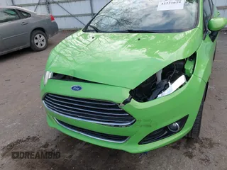 2014 Ford Fiesta Titanium z VIN 3FADP4FJ8EM165941, wystawiony jako IAAI lot #42221629 z przebiegiem 105 582 mil mil oraz . Historia ofert i sprzedaży dostępna na DreamBid. Obrazek 6.