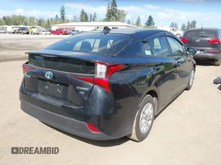 2021 Toyota Prius L Eco with VIN JTDKAMFU3M3140233, listed as a IAAI auction lot 42182685 with 38,842 mi miles and . Bid and sale history available at DreamBid. Image 4.
