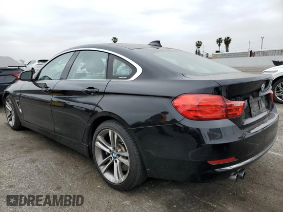 2015 BMW 4 Series 428i with VIN WBA4A5C59FGK15506, listed as a Copart auction lot 54249435 with 27,883 mi miles and Salvage title. Bid and sale history available at DreamBid. Image 2.
