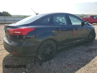 2016 Ford Focus SE with VIN 1FADP3F21GL228871, listed as a Copart auction lot 63506525 with 62,756 mi miles and Salvage title. Bid and sale history available at DreamBid. Image 3.