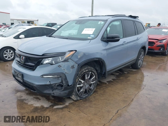 2022 Honda Pilot Sport z VIN 5FNYF5H34NB019222, wystawiony jako IAAI lot #41905708 z przebiegiem 143 397 mil mil oraz . Historia ofert i sprzedaży dostępna na DreamBid. Obrazek 2.