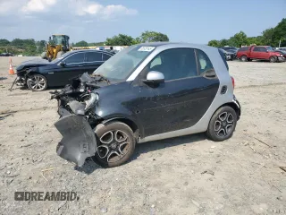 2016 Smart fortwo Passion с VIN WMEFJ5DA8GK048725, выставлен на аукционе Copart как лот 65929145 с пробегом Не указан миль и Чистый • Clean title. История ставок и продаж доступна на DreamBid. Изображение 1.