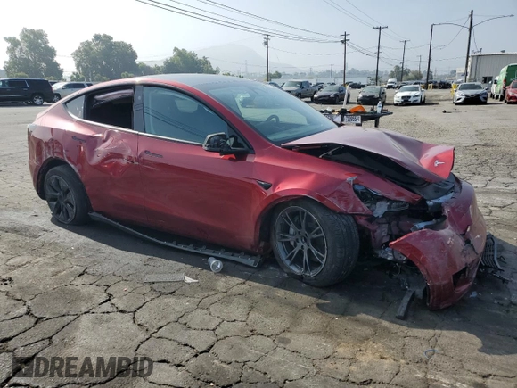 2024 Tesla Model Y с VIN 7SAYGDED3RF166676, выставлен на аукционе Copart как лот 60792165 с пробегом 22 445 миль миль и Списание • Salvage title. История ставок и продаж доступна на DreamBid. Изображение 4.