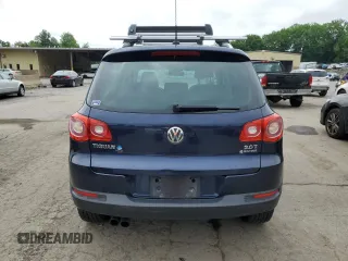 2011 Volkswagen Tiguan SEL z VIN WVGBV7AX2BW534482, wystawiony jako Copart lot #61097265 z przebiegiem 186 282 mil mil oraz Czysty tytuł • Clean title. Historia ofert i sprzedaży dostępna na DreamBid. Obrazek 6.