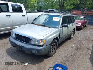2002 Subaru Forester L with VIN JF1SF63572H736509, listed as a IAAI auction lot 42802863 with 241,678 mi miles and . Bid and sale history available at DreamBid. Image 2.