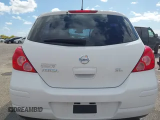 2009 Nissan Versa 1.8 S with VIN 3N1BC13E19L371006, listed as a IAAI auction lot 42064633 with 67,424 mi miles. Bid and sale history available at carsss.com. Image 17.
