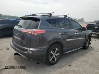 2016 Toyota RAV4 XLE with VIN 2T3RFREV0GW412875, listed as a Copart auction lot 59497545 with 226,604 mi miles and Salvage title. Bid and sale history available at DreamBid. Image 3.