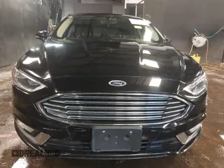 2017 Ford Fusion Titanium with VIN 3FA6P0D93HR197617, listed as a IAAI auction lot 41673022 with 65,041 mi miles and . Bid and sale history available at DreamBid. Image 12.