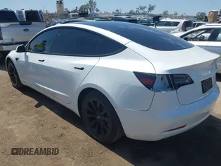2022 Tesla Model 3 Long Range with VIN 5YJ3E1EB1NF289719, listed as a IAAI auction lot 41968273 with 73,368 mi miles and . Bid and sale history available at DreamBid. Image 3.