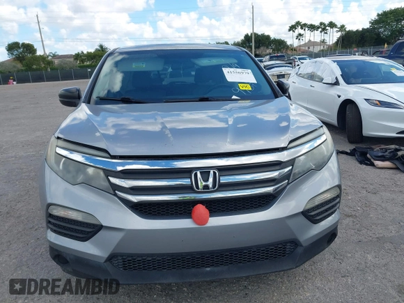 2016 Honda Pilot LX with VIN 5FNYF6H1XGB099987, listed as a IAAI auction lot 41556979 with 98,373 mi miles. Bid and sale history available at carsss.com. Image 12.