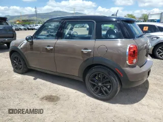 2012 MINI Countryman with VIN WMWZB3C59CWM04522, listed as a Copart auction lot 56605865 with 33,186 mi miles and Salvage title. Bid and sale history available at DreamBid. Image 2.