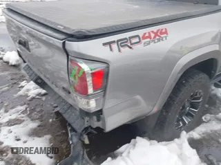 2021 Toyota Tacoma SR z VIN 3TMCZ5AN0MM386867, wystawiony jako IAAI lot #41580426 z przebiegiem 46 559 mil mil oraz . Historia ofert i sprzedaży dostępna na DreamBid. Obrazek 18.