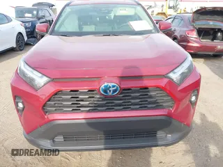 2023 Toyota RAV4 Hybrid XLE Premium z VIN JTMB6RFV8PD114927, wystawiony jako IAAI lot #41844127 z przebiegiem 14 582 mil mil oraz . Historia ofert i sprzedaży dostępna na DreamBid. Obrazek 12.