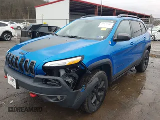 2018 Jeep Cherokee Trailhawk with VIN 1C4PJMBX3JD512813, listed as a IAAI auction lot 41457312 with 125,644 mi miles. Bid and sale history available at carsss.com. Image 21.