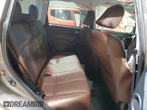 2018 Subaru Forester Touring z VIN JF2SJAWC4JH522454, wystawiony jako Copart lot #58204655 z przebiegiem 117 611 mil mil oraz Szkoda całkowita • Salvage title. Historia ofert i sprzedaży dostępna na DreamBid. Obrazek 11.