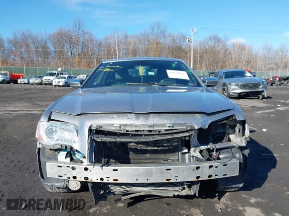 2014 Chrysler 300 C with VIN 2C3CCAKG2EH273274, listed as a IAAI auction lot 41638665 with 164,888 mi miles and . Bid and sale history available at carsss.com. Image 12.