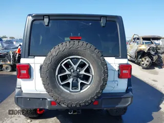 2024 Jeep Wrangler Rubicon with VIN 1C4PJXFG6RW291185, listed as a IAAI auction lot 41773050 with 12,400 mi miles and . Bid and sale history available at DreamBid. Image 16.