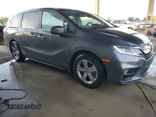 2019 Honda Odyssey EX-L with VIN 5FNRL6H71KB126181, listed as a Copart auction lot 77083064 with 48,590 mi miles and Salvage Title. Bid and sale history available at DreamBid. Image 4.