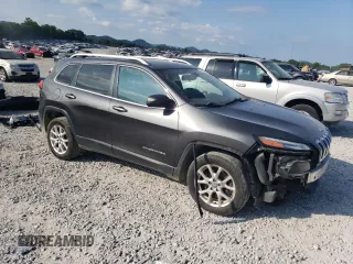 2016 Jeep Cherokee Latitude with VIN 1C4PJLCS7GW135851, listed as a Copart auction lot 64583265 with 147,191 mi miles and Salvage title. Bid and sale history available at DreamBid. Image 4.