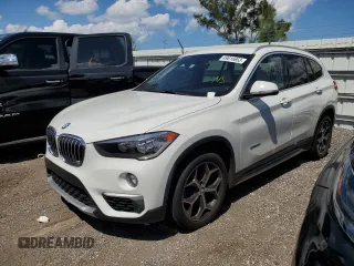 2018 BMW X1 sDrive28i with VIN WBXHU7C36J5H42760, listed as a Copart auction lot 49616663 with 89,603 mi miles. Bid and sale history available at carsss.com. Image 1.