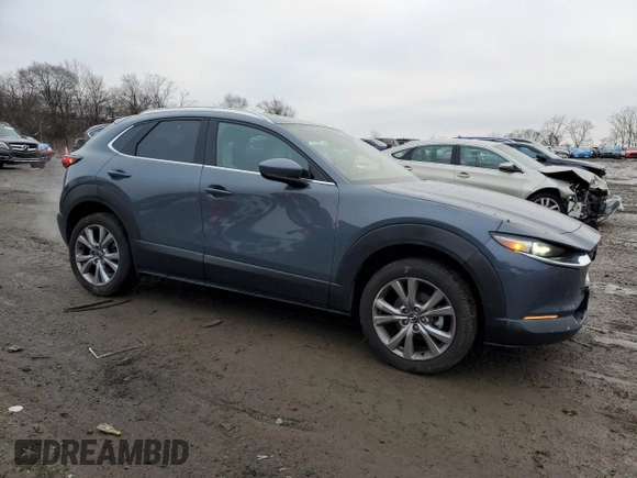 2020 Mazda CX-30 Premium with VIN 3MVDMBEM4LM136726, listed as a Copart auction lot 43734155 with 71,318 mi miles and Salvage title. Bid and sale history available at DreamBid. Image 4.
